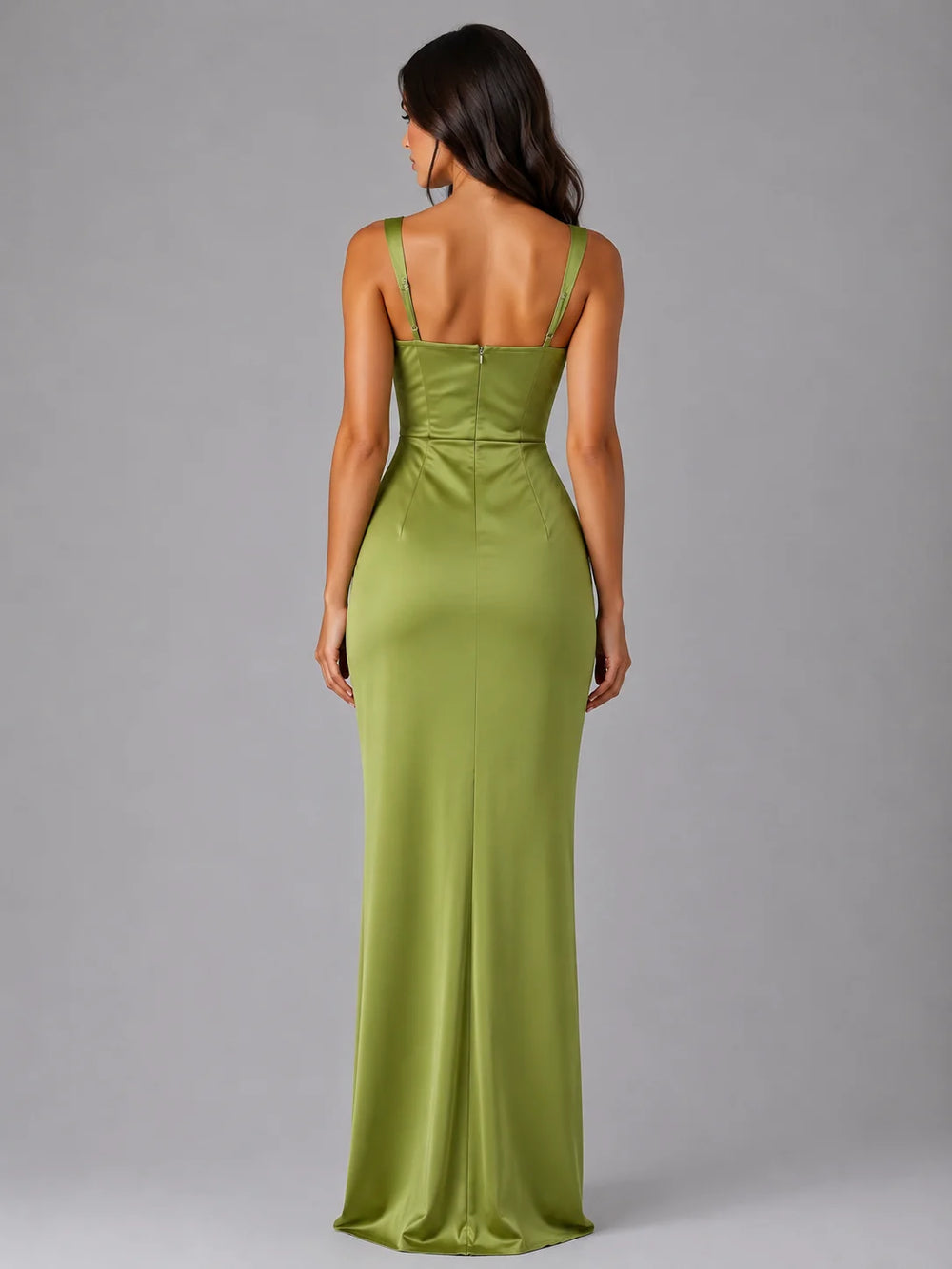 Olive green satin-look maxi dress with ruched waist detail and delicate shoulder straps for wedding guest styling