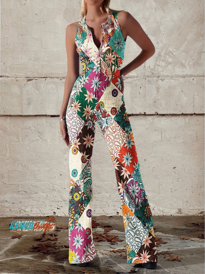 Floral patchwork jumpsuit with deep V-neckline and wide leg silhouette in vibrant mixed print
