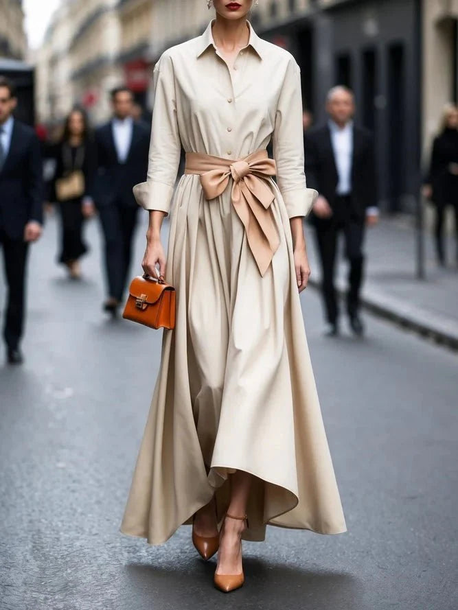 Back view of women's shirt maxi dress highlighting long sleeves and structured tailoring