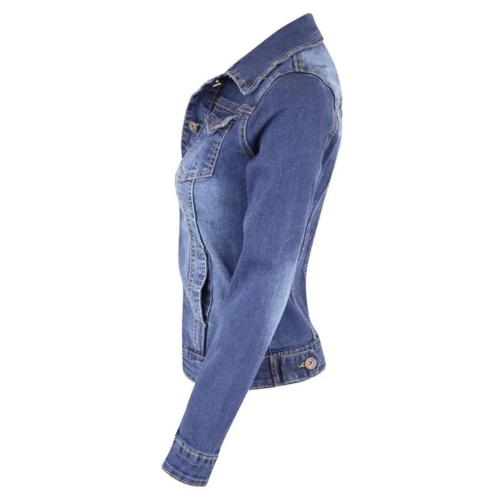 Back view of women's casual denim jacket showing classic construction and mid-blue denim finish