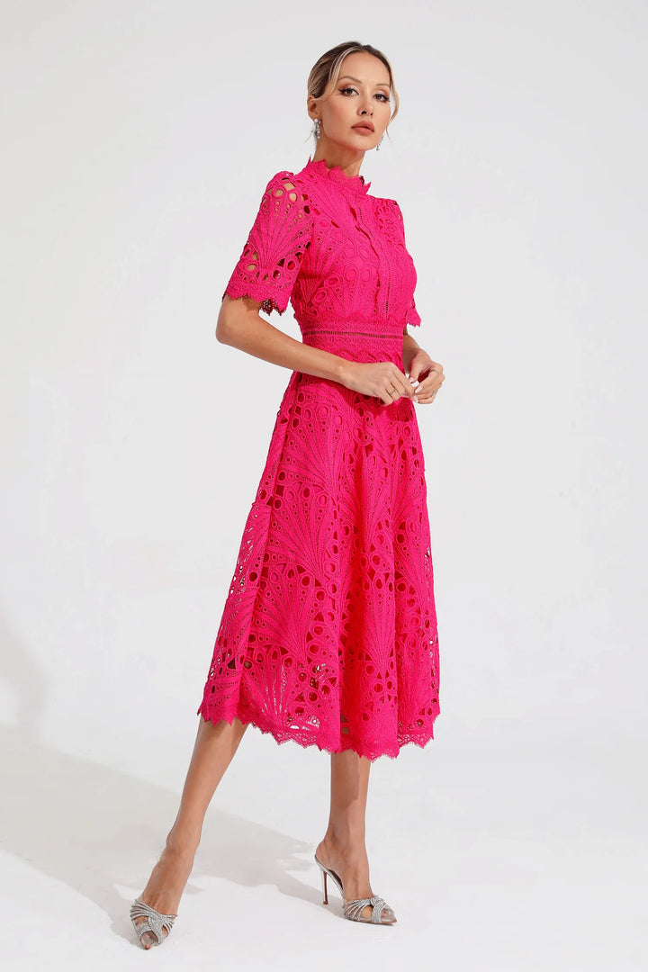 Full-length view of lace midi dress showing flattering A-line silhouette and scalloped hem