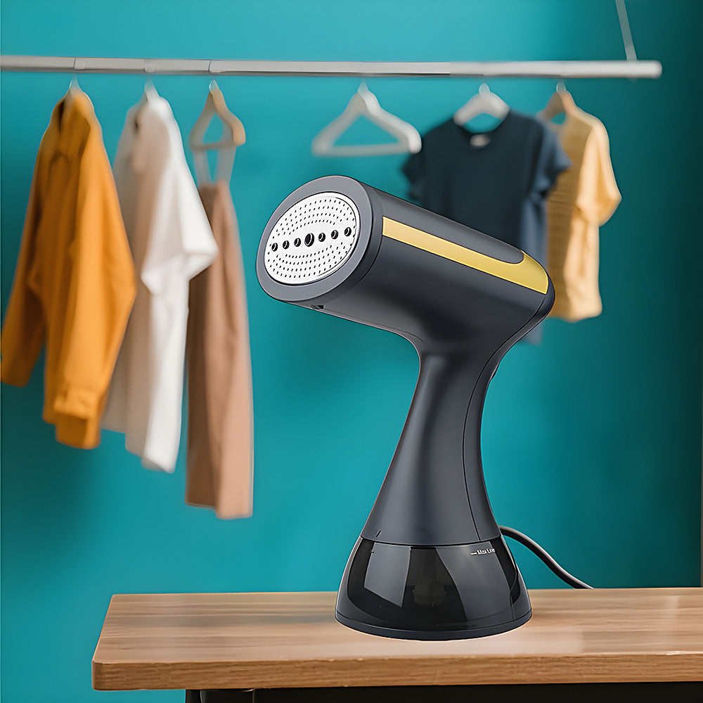 Handheld garment steamer in black and gold