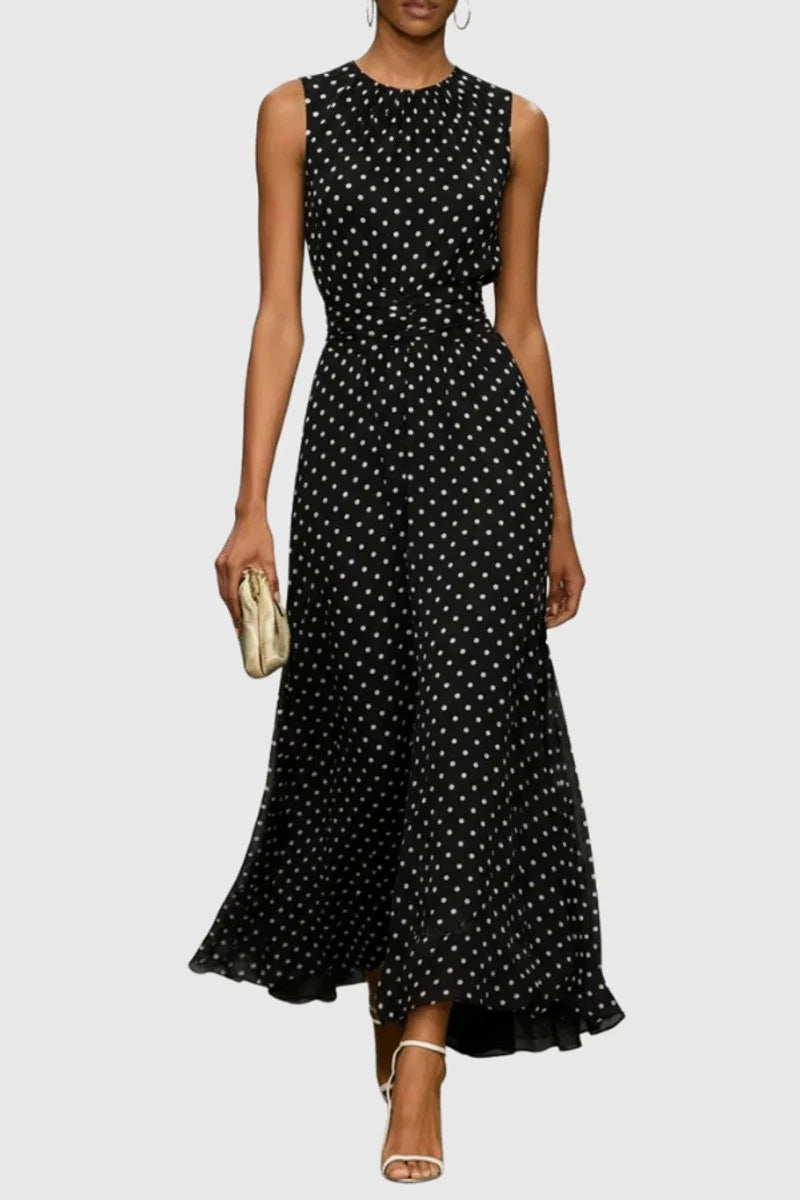 Full-length view of polka dot sleeveless maxi dress for summer weddings