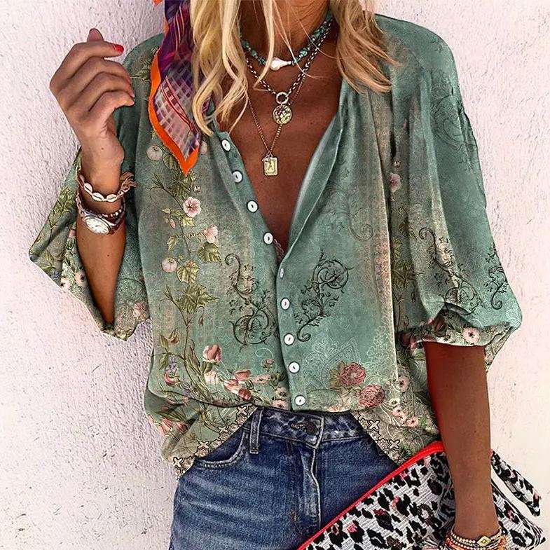 Women's floral print V-neck blouse in sage green with button-down front and three-quarter sleeves