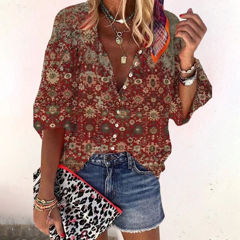 Side view of women's floral print blouse showing flowing three-quarter sleeve and relaxed drape