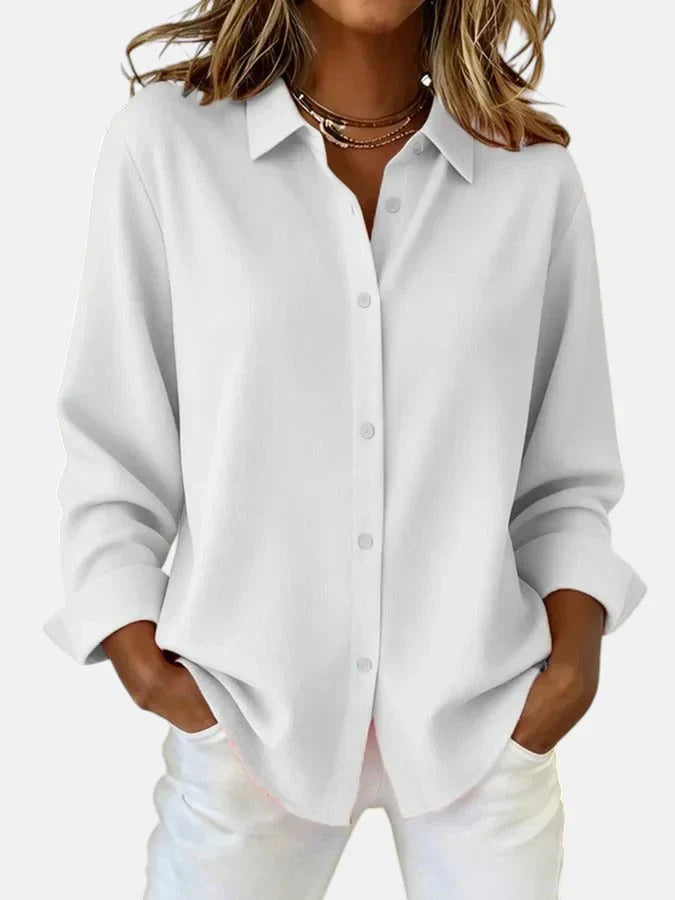 Back view of women's oversized pink shirt showing relaxed silhouette and long sleeve construction