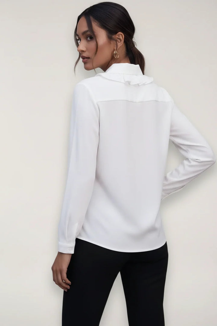 Close-up view of Women's Tailored Button-Up Blouse showing structured fabric and refined silhouette