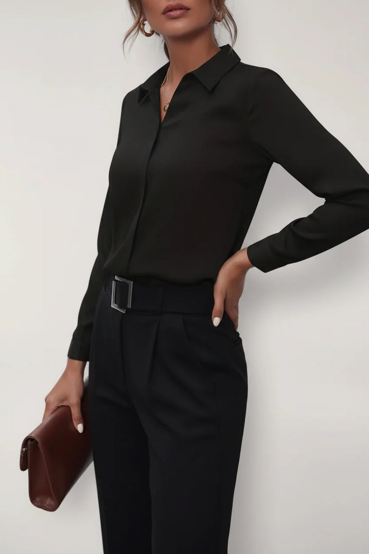 Side view of Women's Tailored Button-Up Blouse displaying subtle waist definition and long sleeves