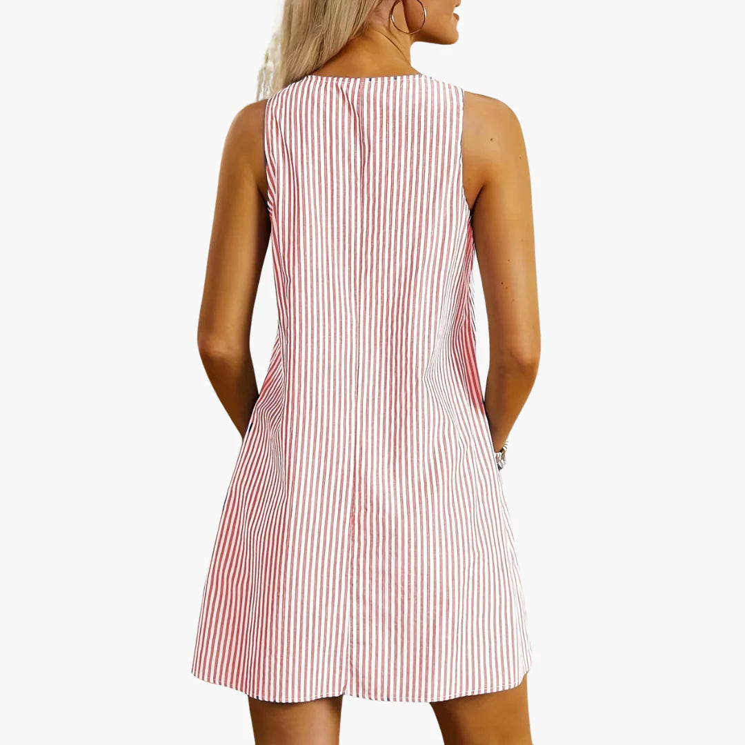 Casual striped mini dress featuring vertical stripes and side pocket details for summer