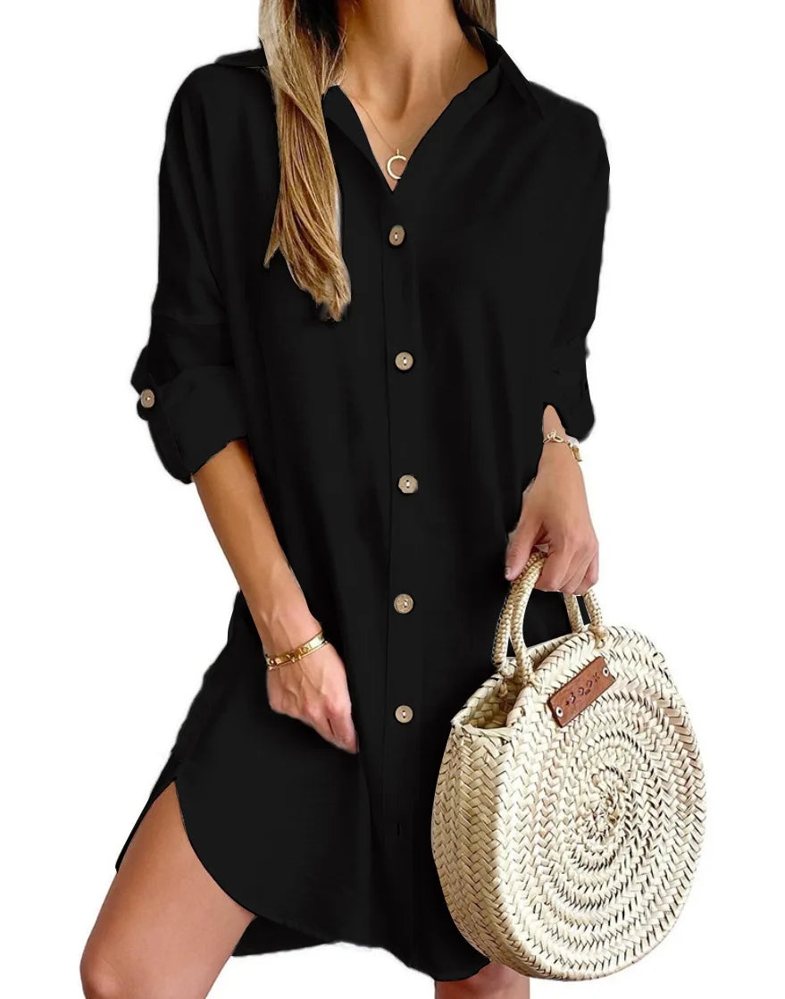 Side view of relaxed linen shirt dress showing midi length and side split detail