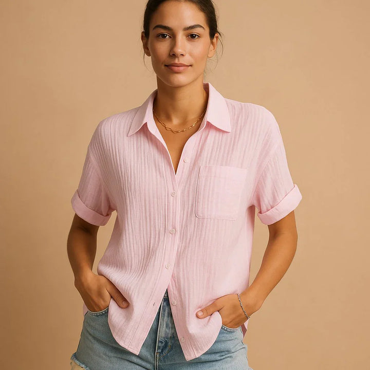 Back view of women's relaxed shirt displaying relaxed silhouette and double-weave construction