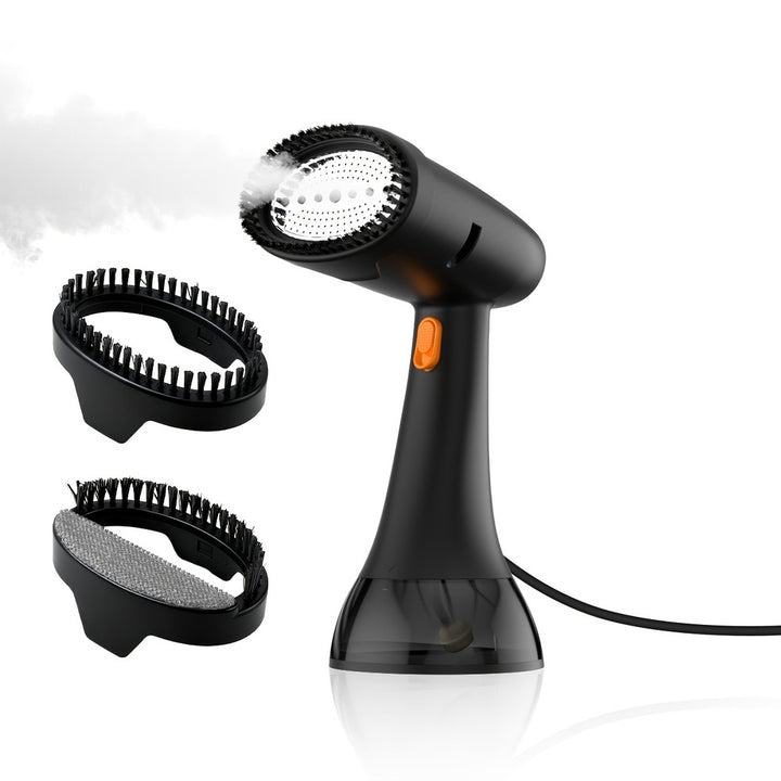 Handheld garment steamer in black and orange with two brush attachments