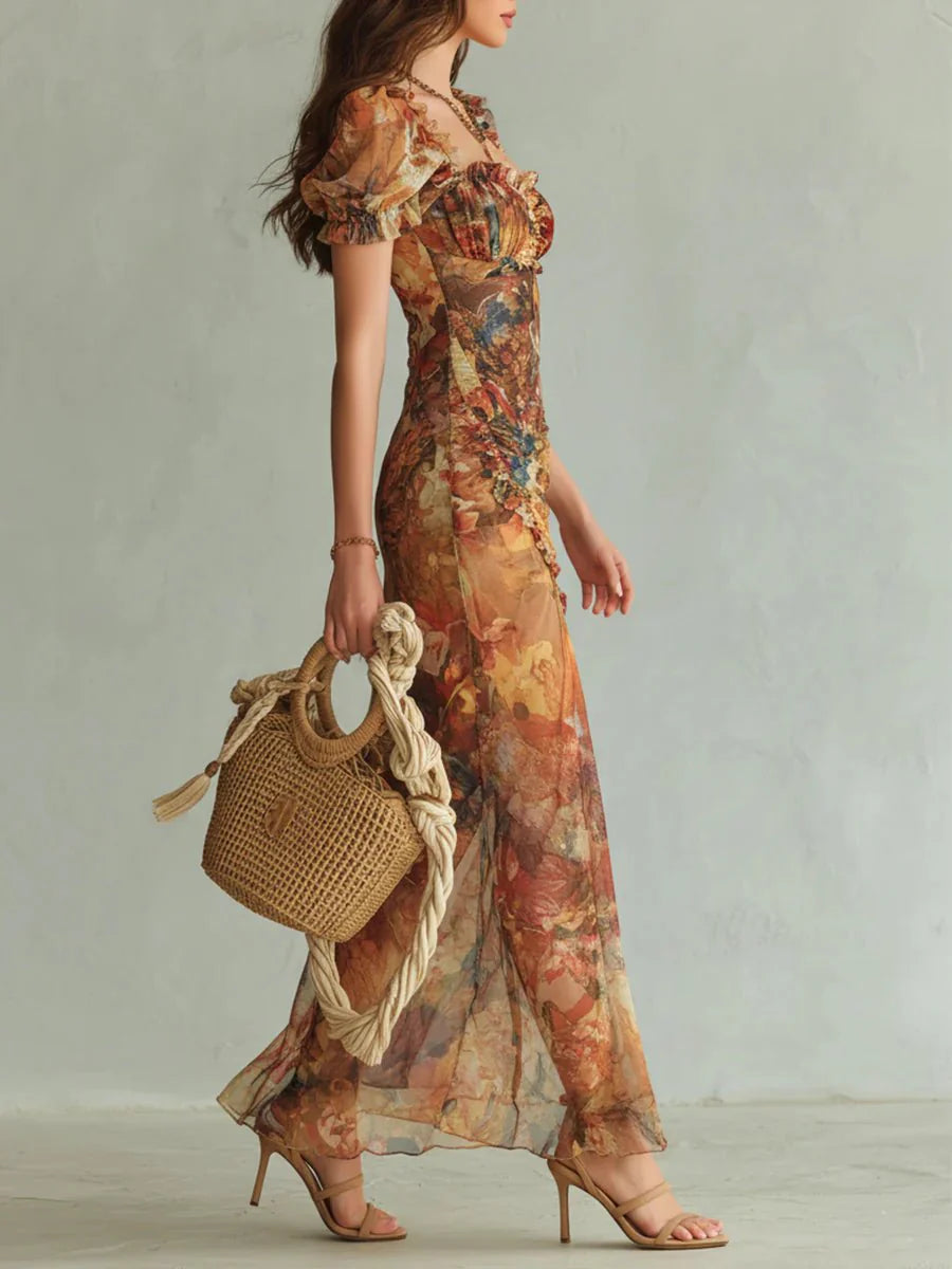 Side view showing flowing skirt and side slit detail on floral print maxi dress
