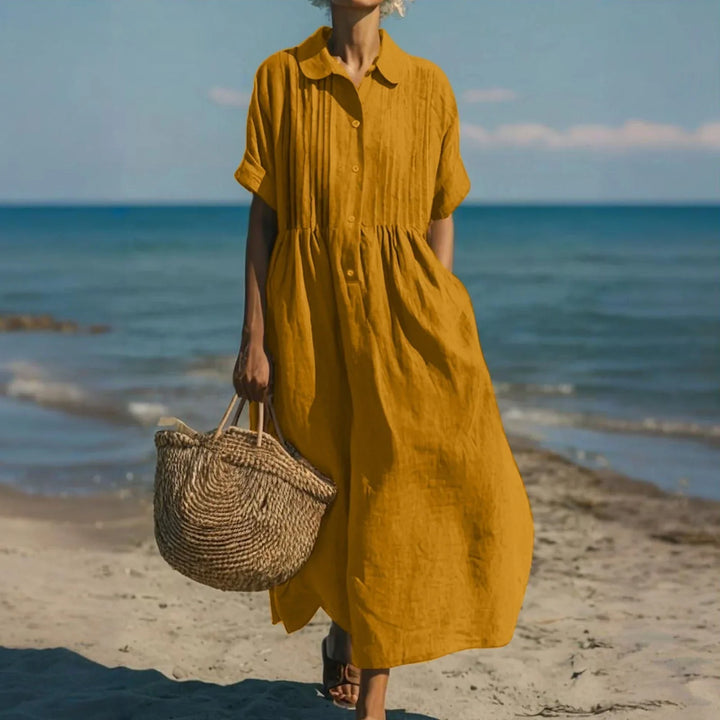 Woman styling collared button midi dress with sandals for casual summer outfit