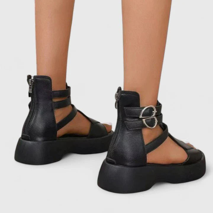 Side view of women's gladiator platform sandals showing crossover straps and thick platform base