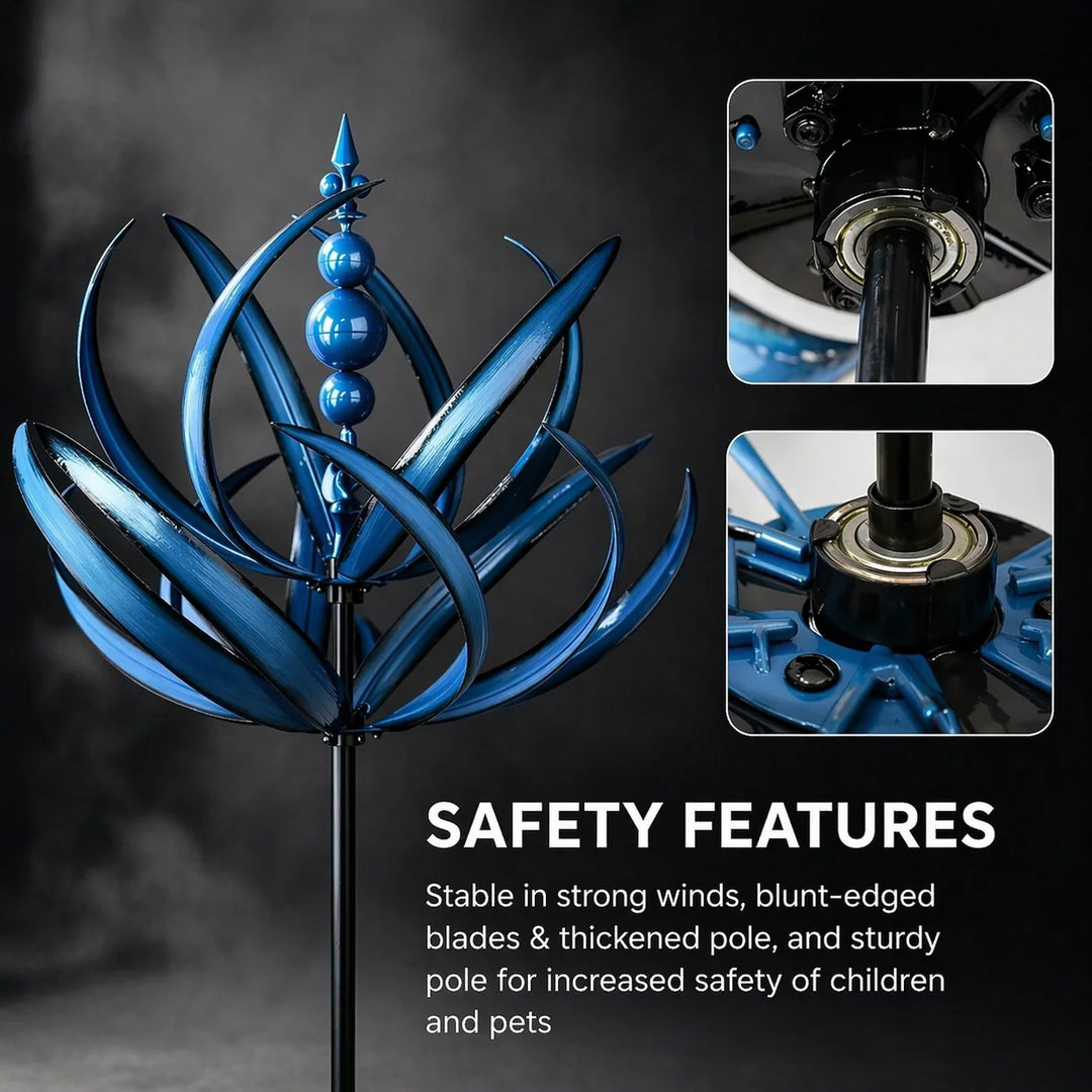Metal garden wind spinner showing fleur-de-lis finial and curved petal blade construction detail