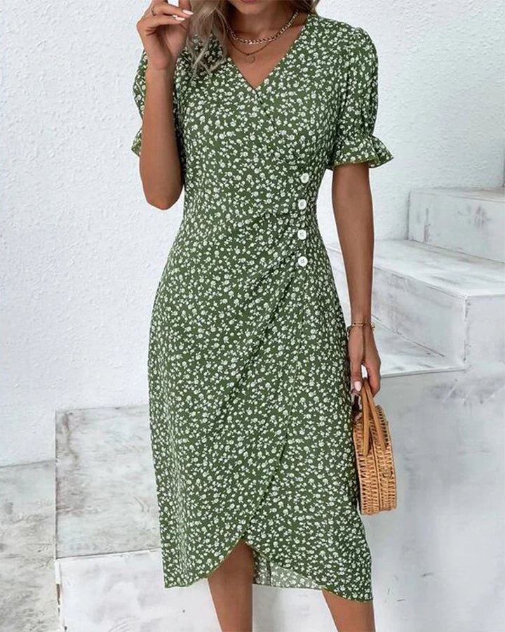 Floral wrap dress featuring ruffled short sleeves and side tie for customisable fit