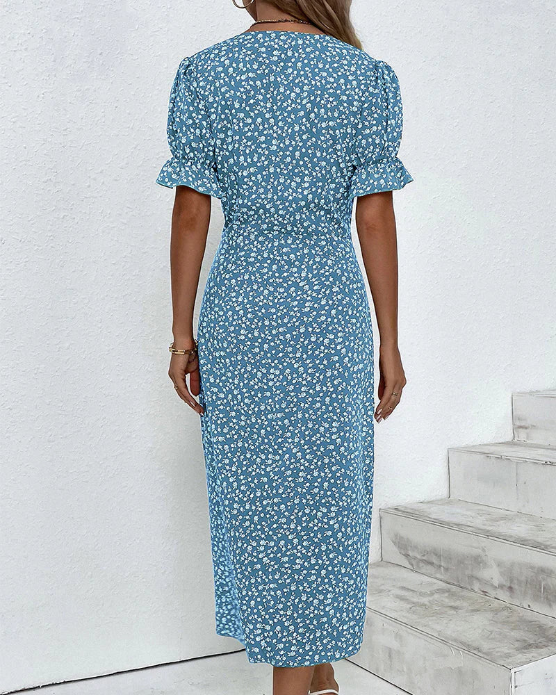 Floral midi dress with wrap front and ruffled sleeves, ideal for weekend and evening occasions