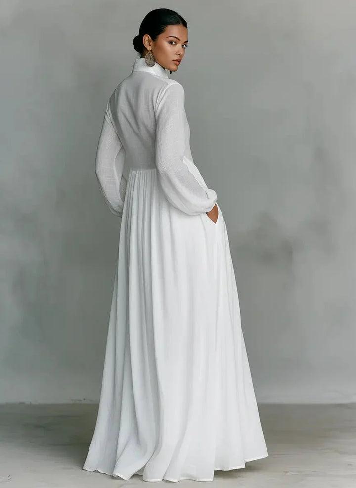 Side view of maxi dress showing flowing silhouette and textured fabric drape