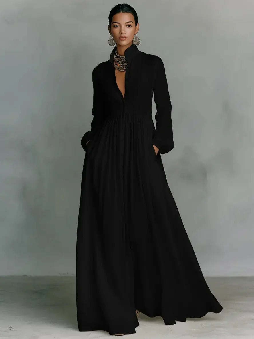 Full-length view of maxi dress with long sleeves and gathered waist