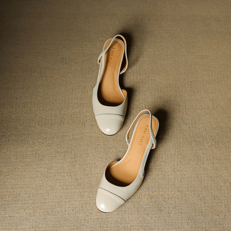 Detail of women's pumps cushioned insole and smooth leather lining for all-day comfort