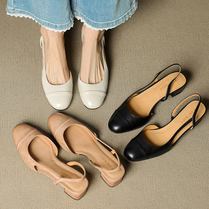 Women's slingback heels in neutral leather with almond toe and open-back silhouette