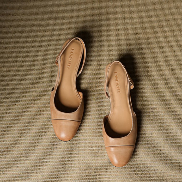 Women's almond toe slingback pumps styled with denim showing open-back silhouette and block heel
