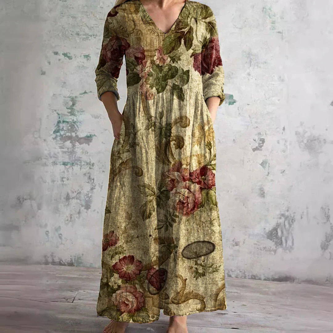 Full-length view of floral print maxi dress in neutral tone with botanical print throughout