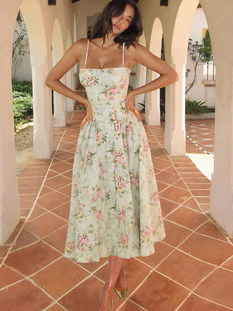 Women's Floral Strap Midi Wedding Guest Dress in soft pastel floral print with structured bodice and flowing skirt