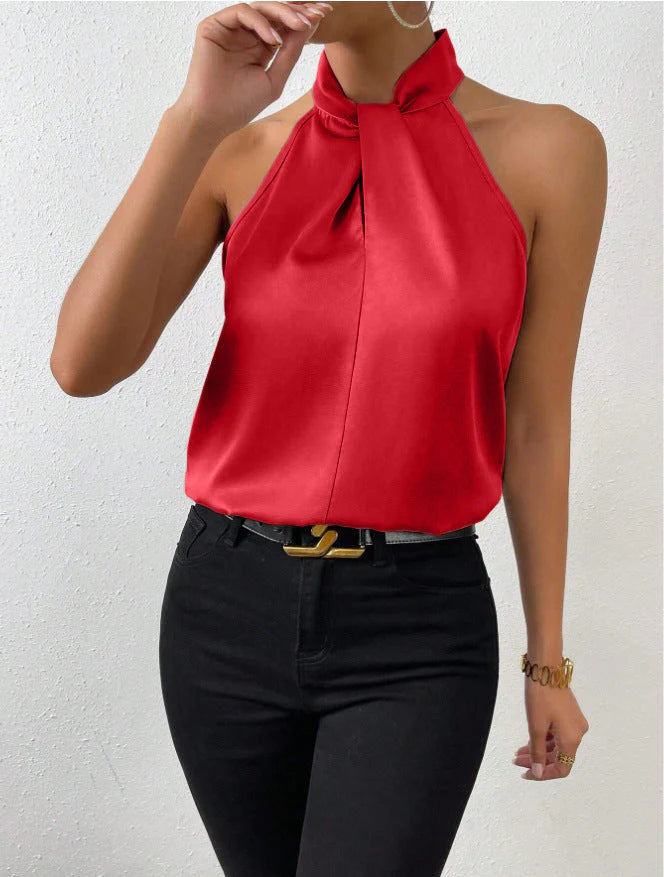 Close-up of fabric texture on halter neck blouse showing lustrous satin finish
