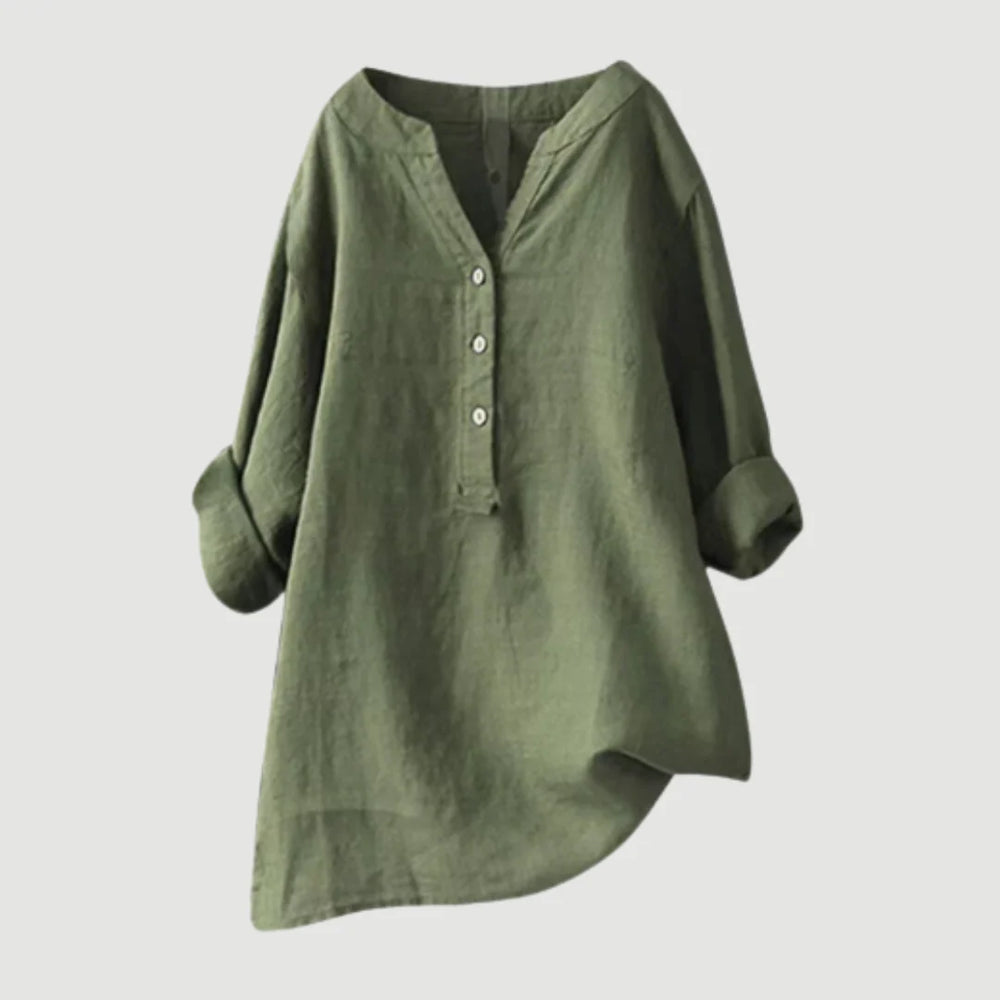 Close-up of women's v-neck linen shirt showing textured woven fabric and button-front detail