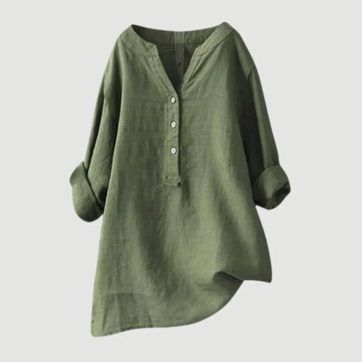 Close-up of women's v-neck linen shirt showing textured woven fabric and button-front detail
