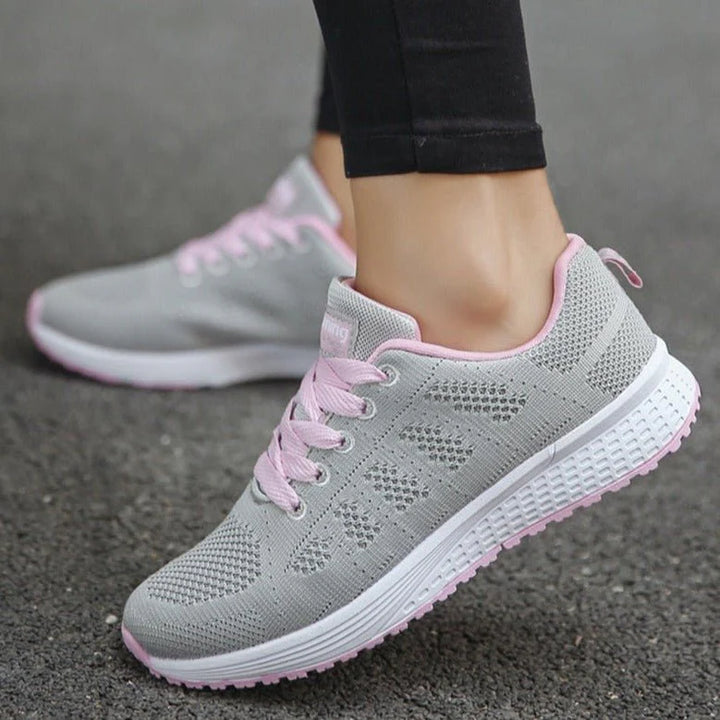 Women's lace-up trainers in white perfect for daily errands and light walks