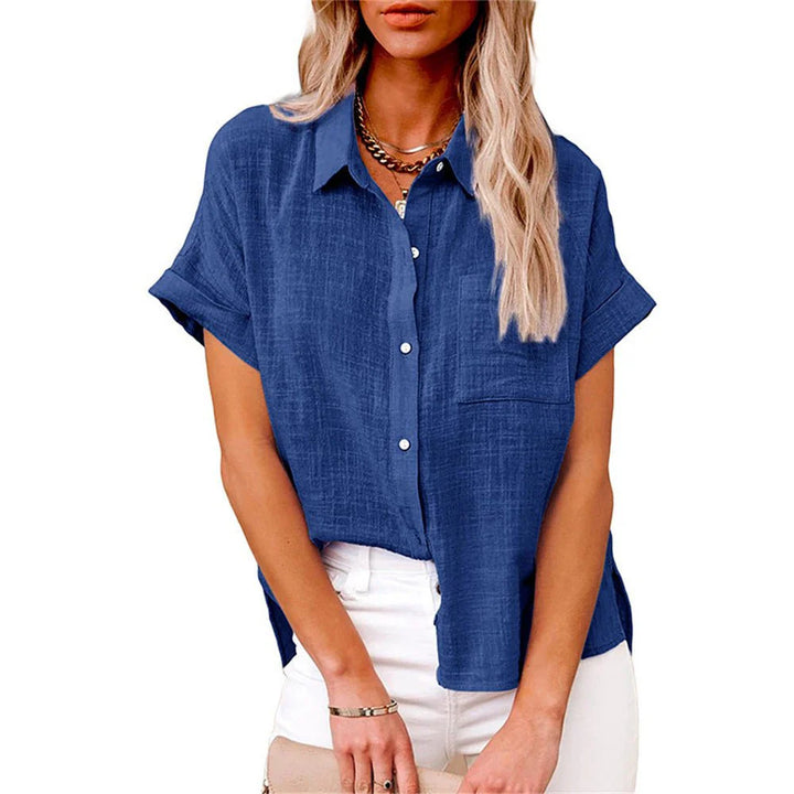 Woman styling pink button-front shirt with denim for casual summer outfit