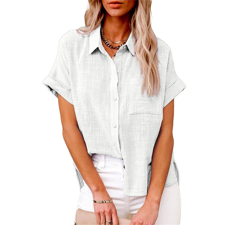 Back view of relaxed-fit short-sleeve shirt showing curved hem and shoulder seam