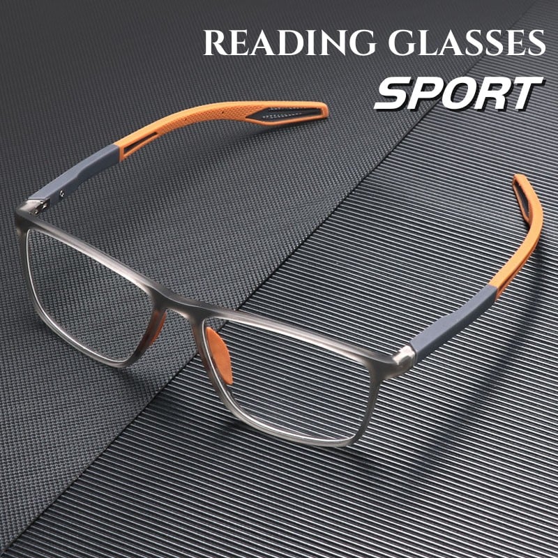 Sport Ultra-Light Anti-Blue Light Progressive Glasses with grey titanium frame and orange temple accents on textured surface