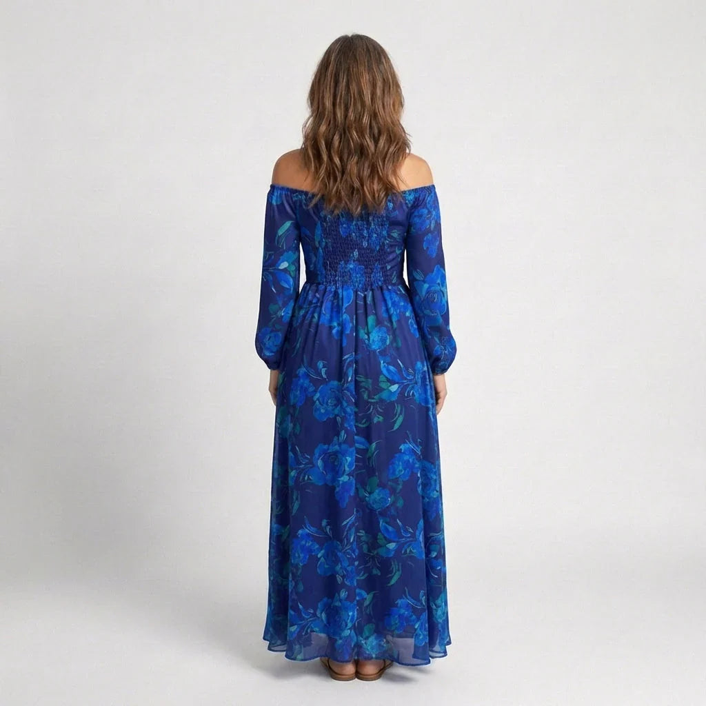 Full-length view of flowing maxi dress with off-the-shoulder neckline and long sleeves