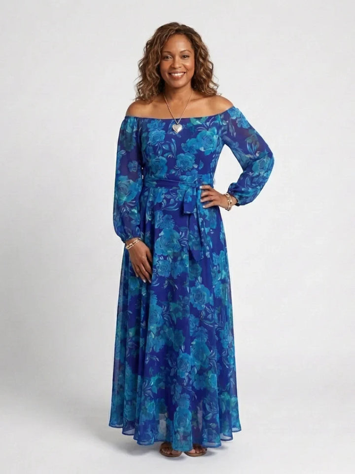 Side view of elegant maxi dress with flattering waist tie and full-length flowing skirt