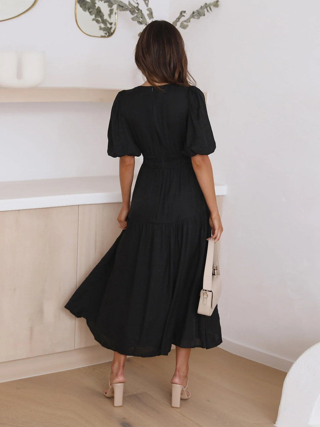 Midi dress paired with accessories for day-to-night styling inspiration