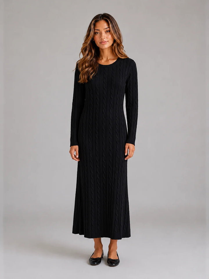 Full-length view of cable knit maxi dress paired with ballet flats for casual styling