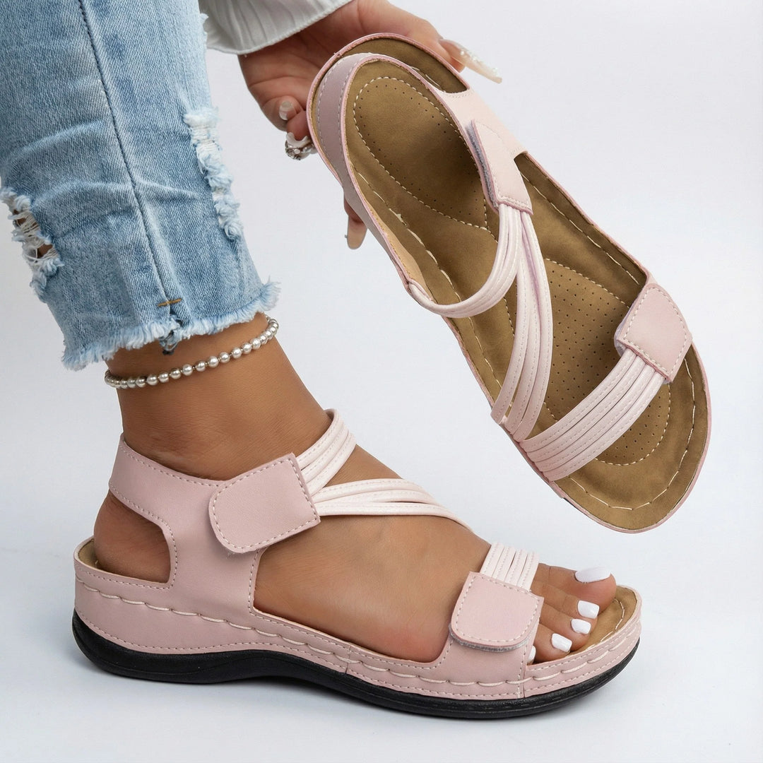 Women's orthopedic sandals with cushioned footbed and adjustable straps for comfortable warm-weather wear