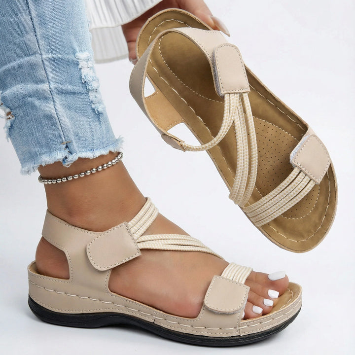 Women's orthopedic sandals in pink shown from multiple angles highlighting adjustable fit and cushioned comfort