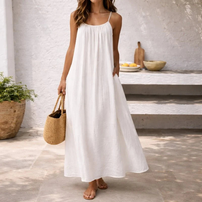 Flowing floor-length dress with side pockets and lightweight drape for summer