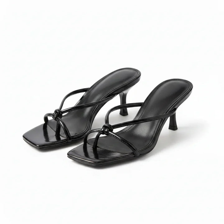 Women's heeled sandals from above showing square toe shape and strap placement