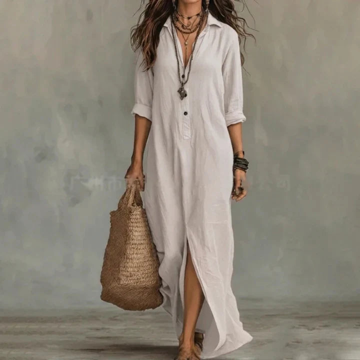 Side view of linen shirt dress showing loose drape and three-quarter sleeve detail