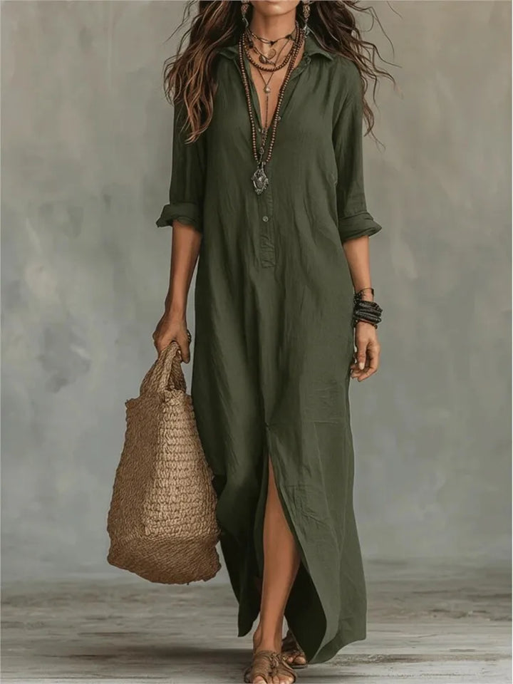 Full-length view of women's relaxed linen shirt dress with side slit detail