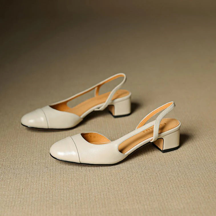 Close-up of slip-resistant rubber outsole on women's slingback block heel pumps
