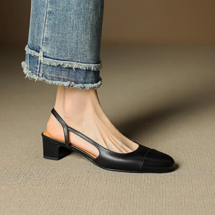 Beige leather slingback pumps with open-back silhouette and slip-resistant rubber sole