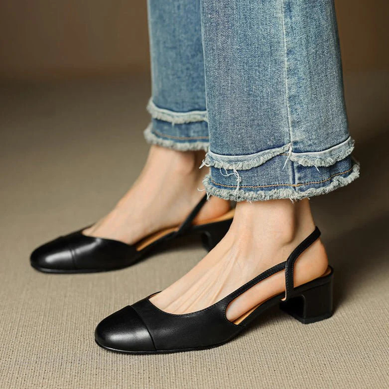 Women's block heel pumps in neutral beige paired with smart jeans for casual elegance