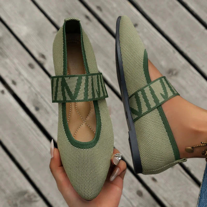 Women's Mary Jane flats with checkered strap, styled for everyday wear
